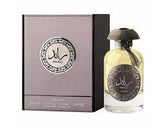 Rawaad perfume in circular bottle with Arabic calligraphy by Lattafa